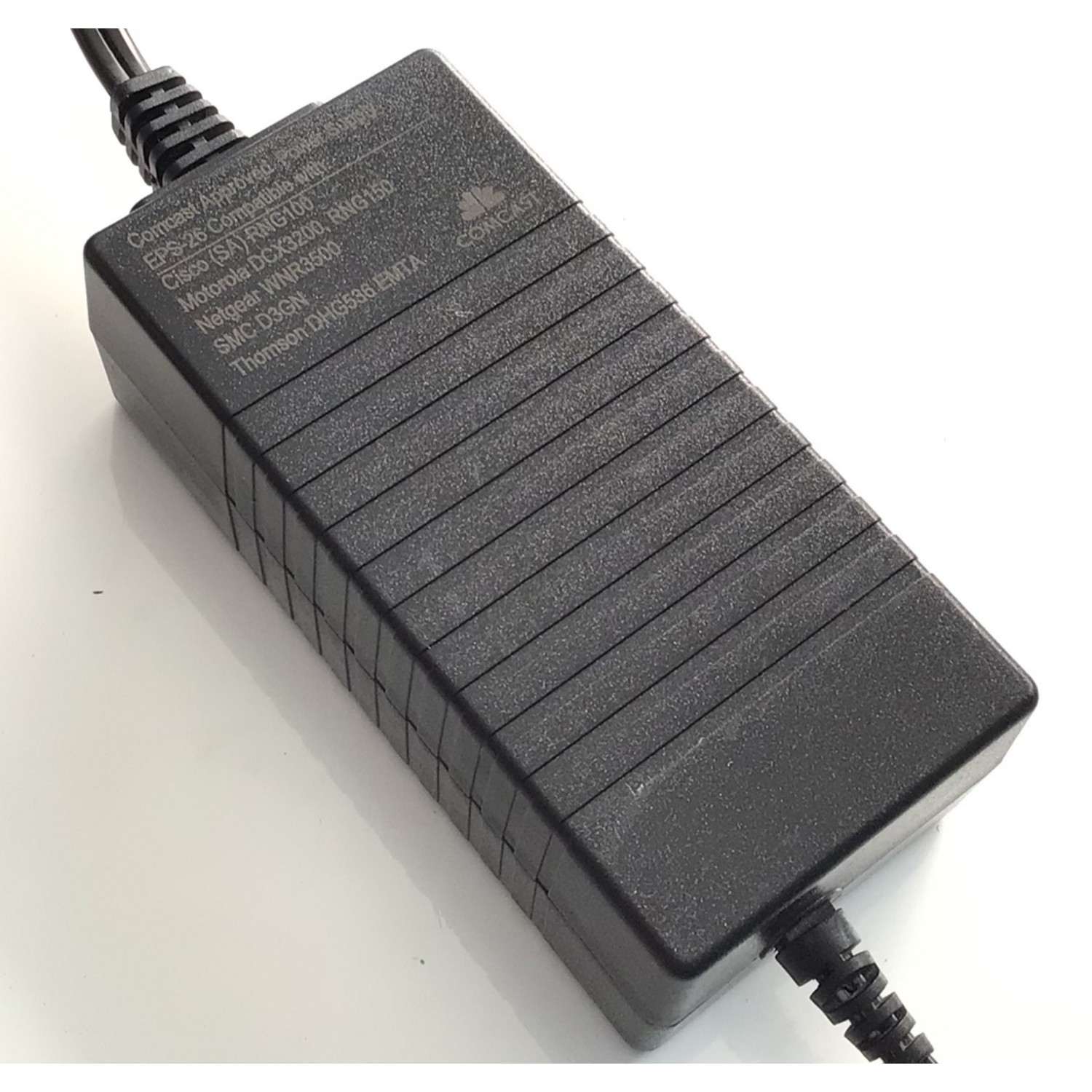 CARGADOR / ADAPTADOR DE FUENTE DE ALIMENTACION COMCAST VCA-VCD / NUMERO DE PARTE 25-2308 / EPS-26 / RNG100 / DCX3200 / RNG150 / WNR3500 / ENTRADA VCA 100-120V~ 1.2A 60HZ / SALIDA VCD 12V 2.67A / MODELO CYUS40-120267B - Imagen 3